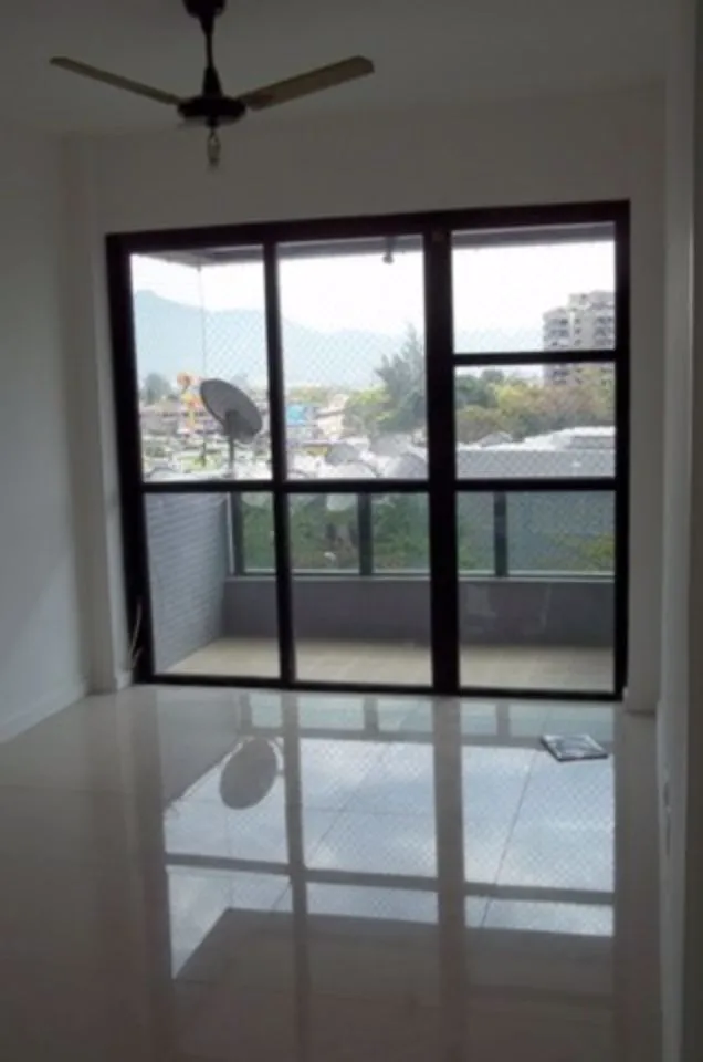 2-bedroom apartment in a building with a pool — photo 3