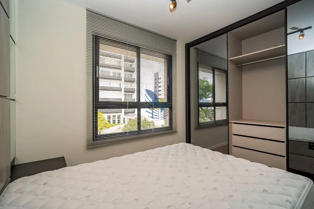 1-bedroom rental with open-plan kitchen and BBQ — photo 17