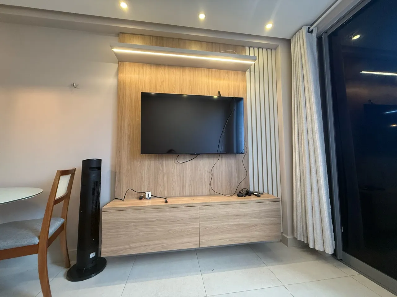 2-bedroom apartment in a building with a pool — photo 13