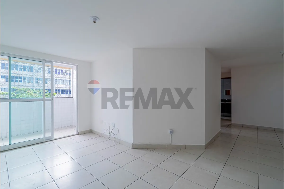 3-bedroom apartment in a building with a pool