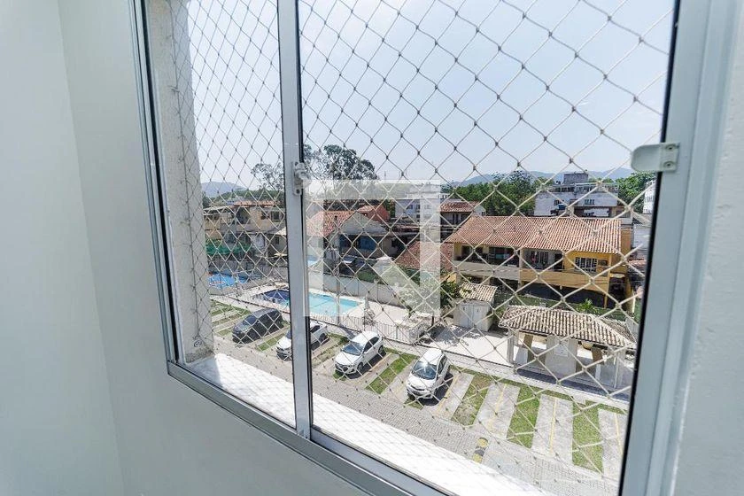 2-bedroom apartment in a building with a pool — photo 19