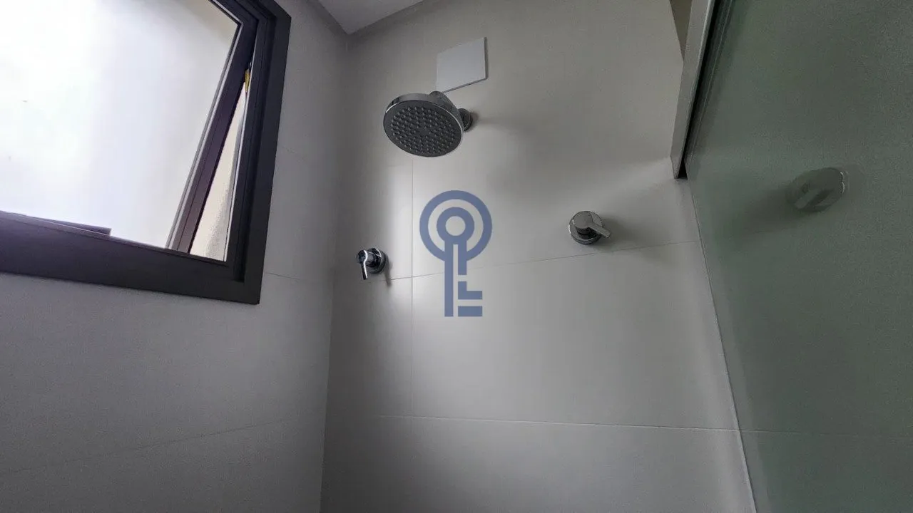 Furnished 59 m² studio with open-plan kitchen and electric stove — photo 17