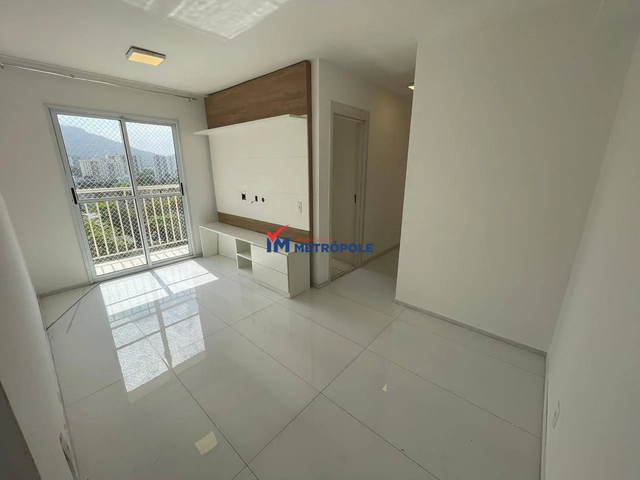 2-bedroom apartment in a building with a pool — photo 5