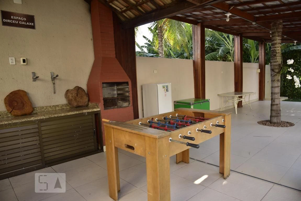 2-bedroom apartment in a building with a pool — photo 16