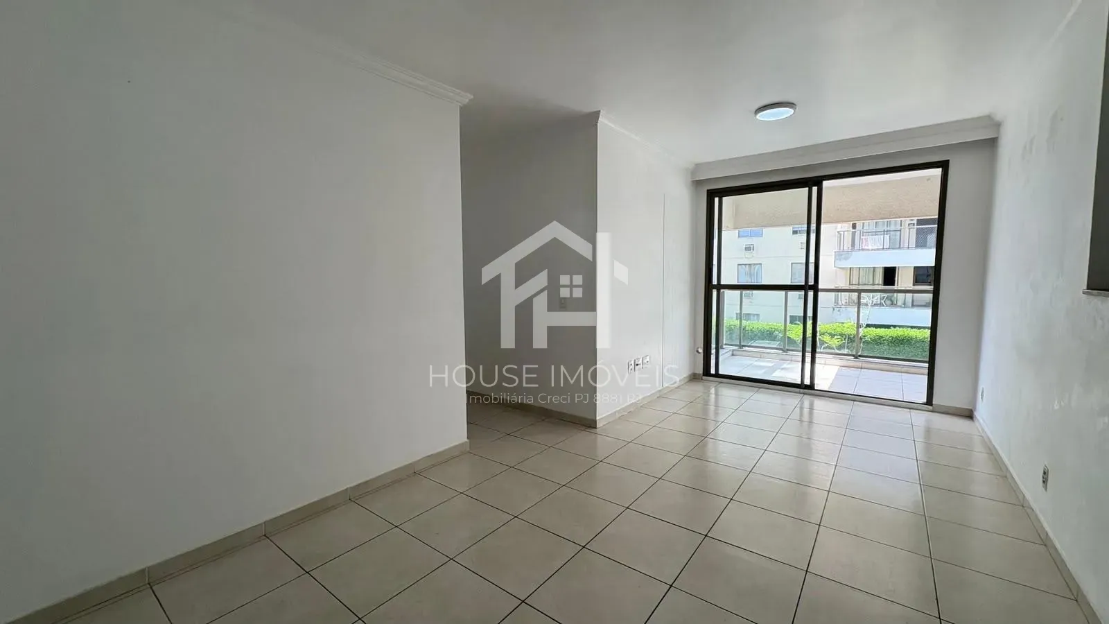 2-bedroom apartment in a building with a tennis court