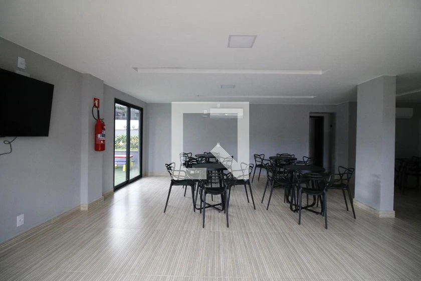 2-bedroom apartment in a building with a pool — photo 12