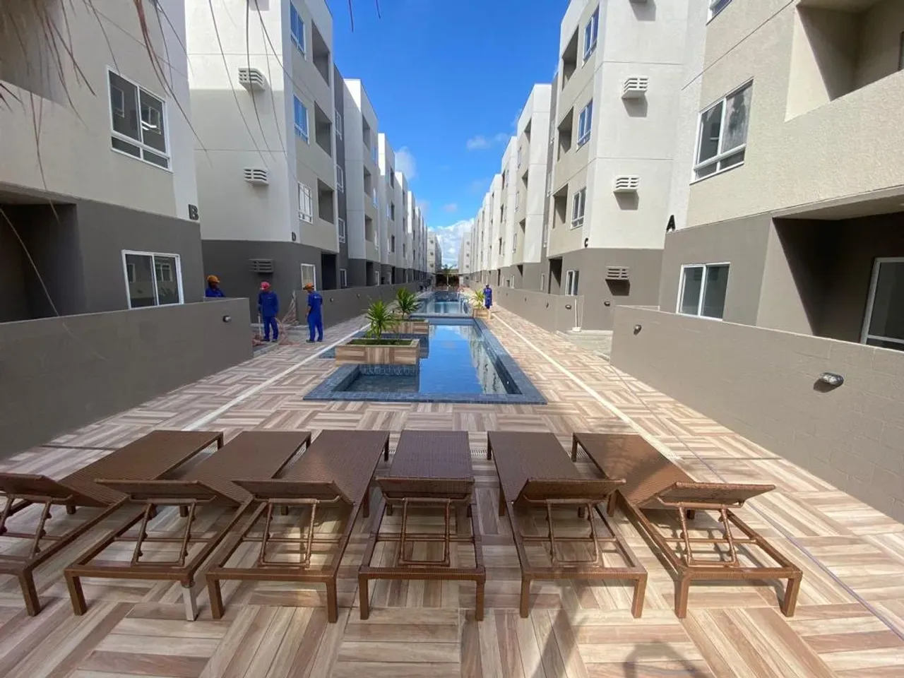 2-bedroom apartment in a building with a pool