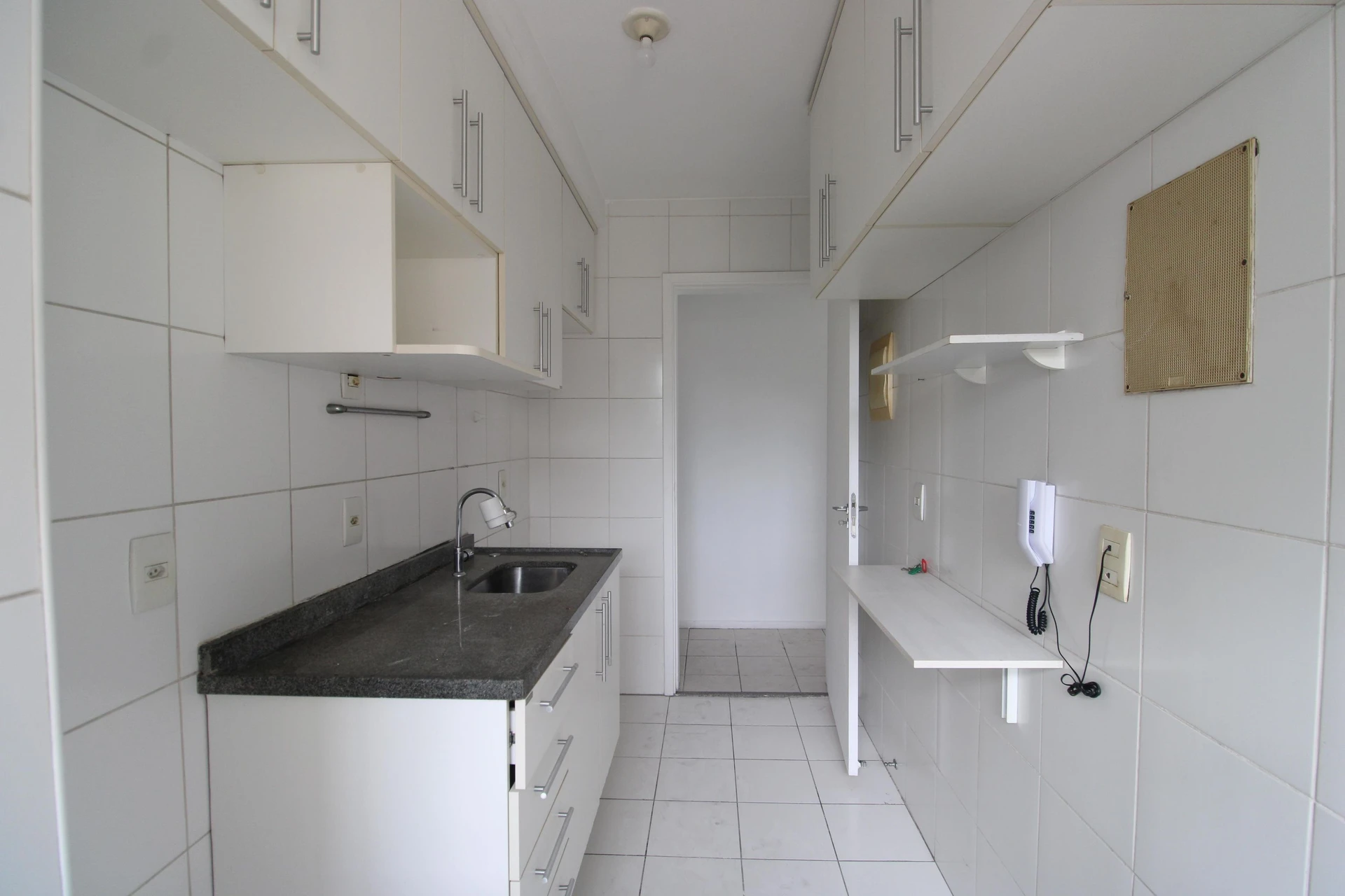Balcony with a grill in a 3-bedroom apartment, 74 m² — photo 15