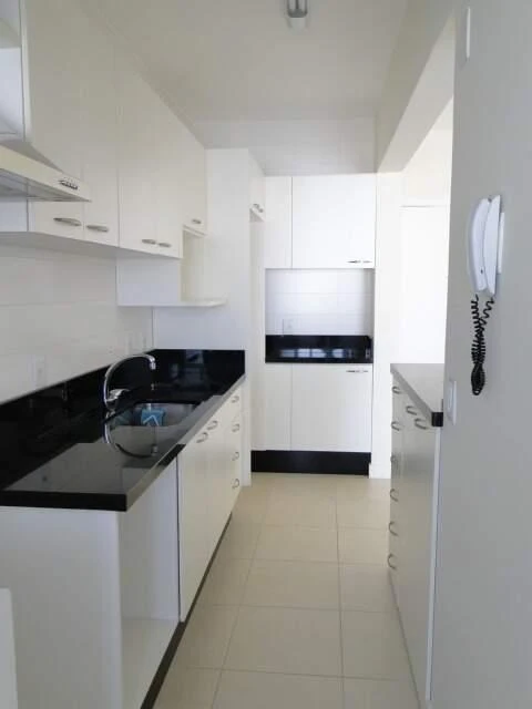 2-bedroom apartment in a building with a pool — photo 7