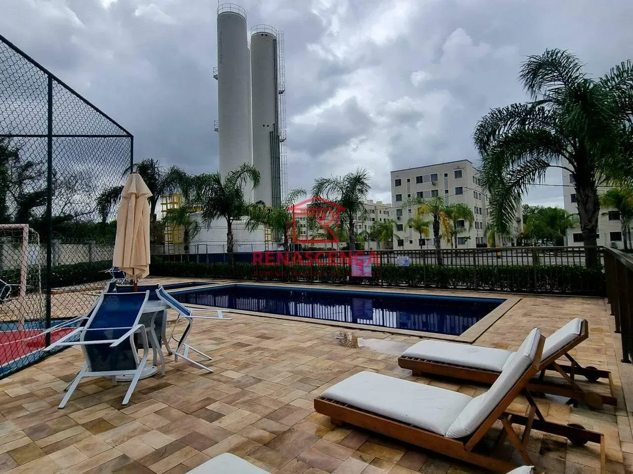 2-bedroom apartment in a building with a pool — photo 25