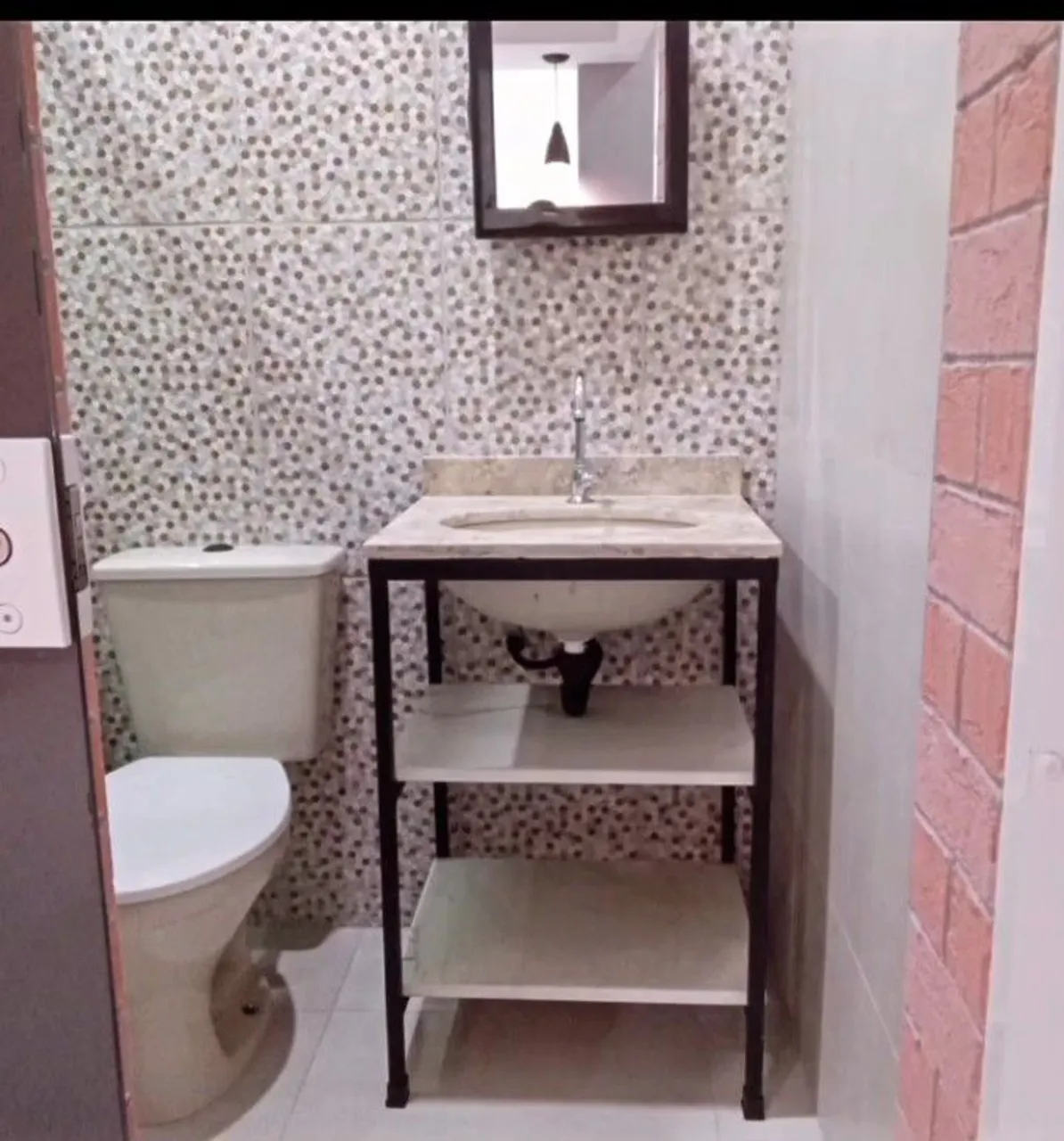 Apartamento com cozinha integrada e sala em plano aberto — photo 13