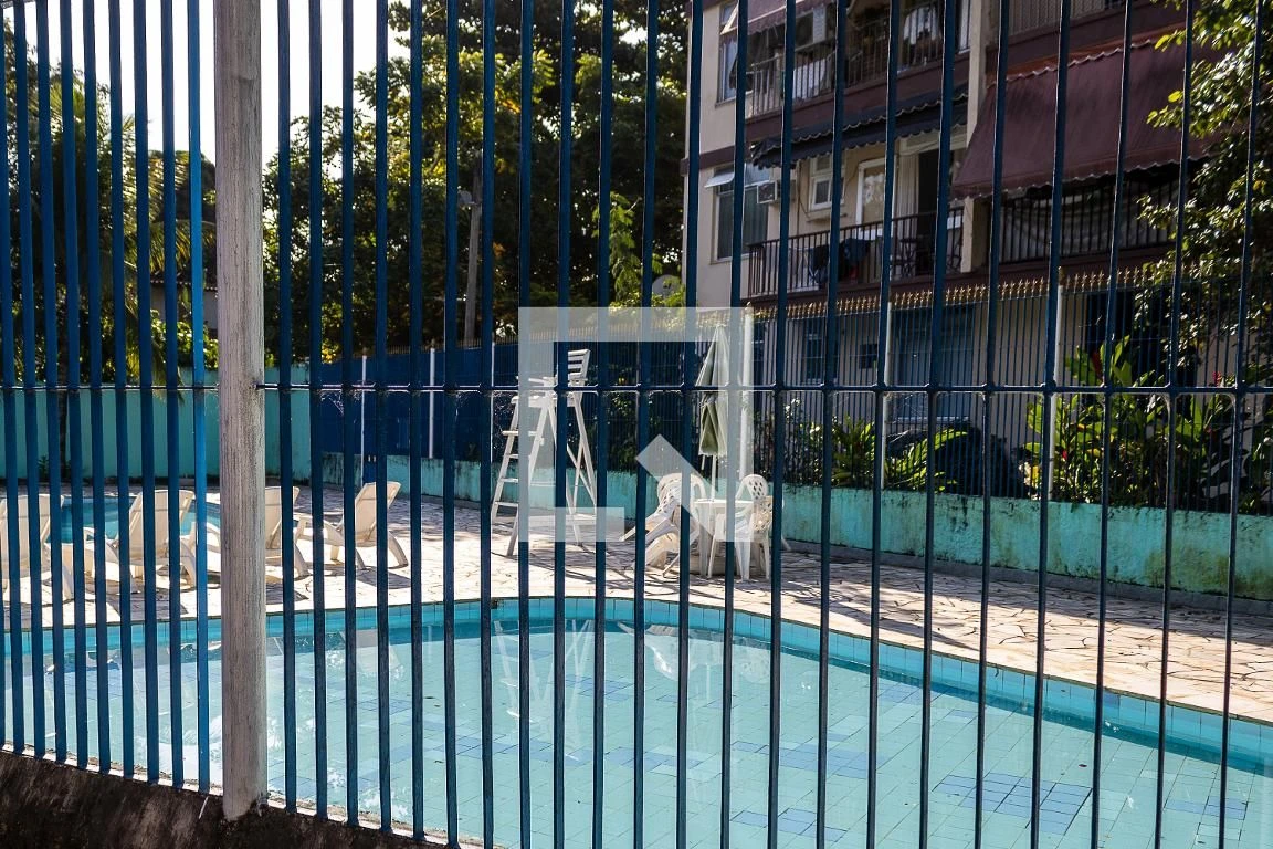 2-bedroom apartment in a building with a pool — photo 35