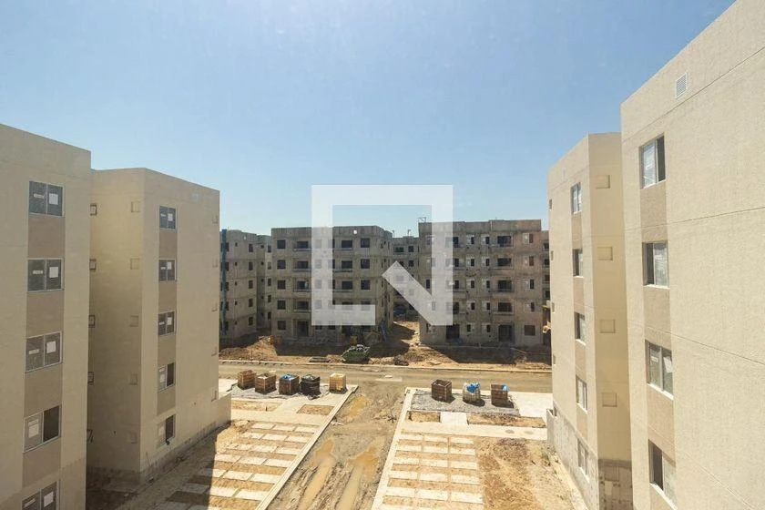 2-bedroom apartment in a building with a pool — photo 13