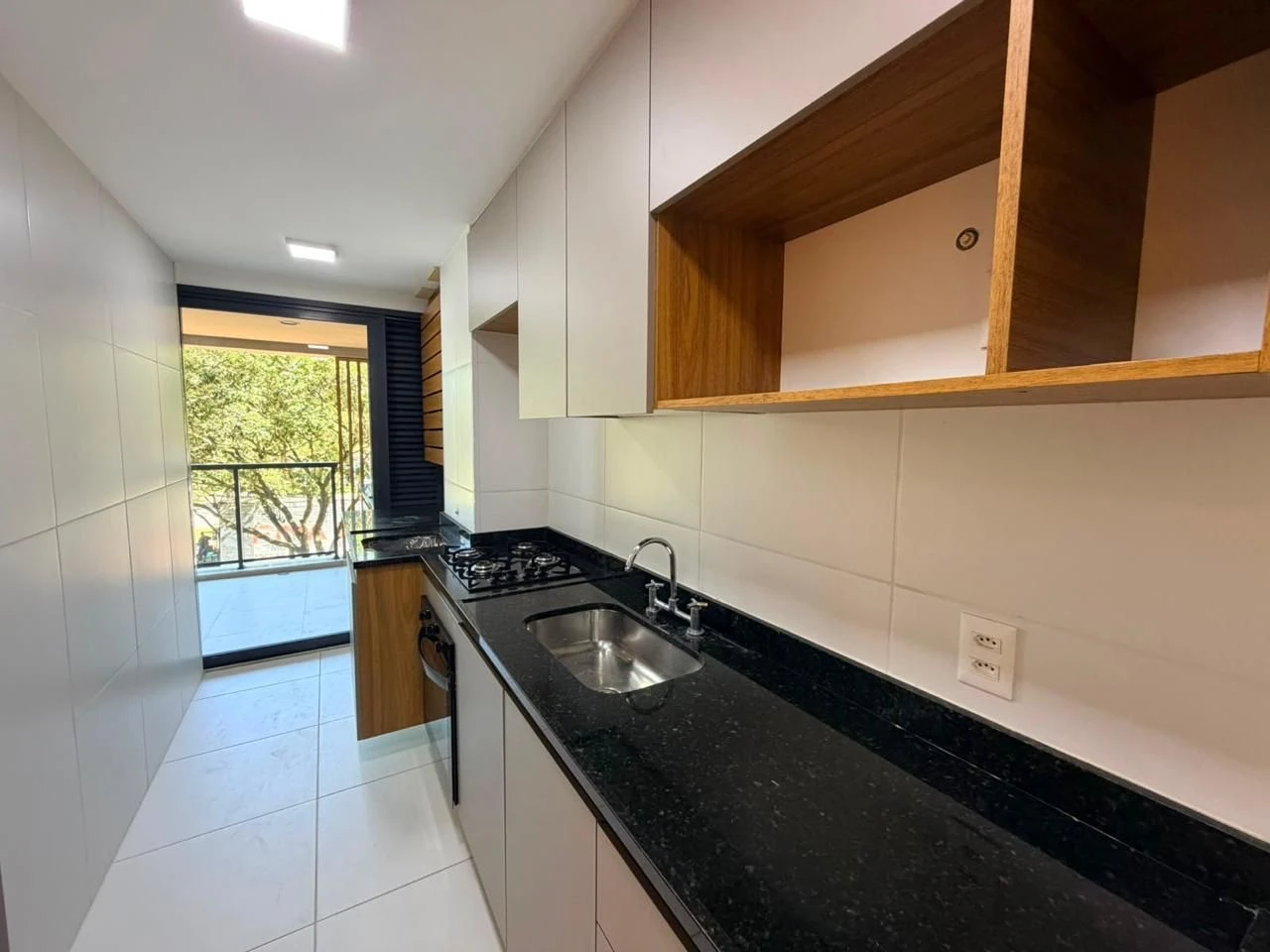 Apartamento com varanda e cozinha integrada a gás — photo 16