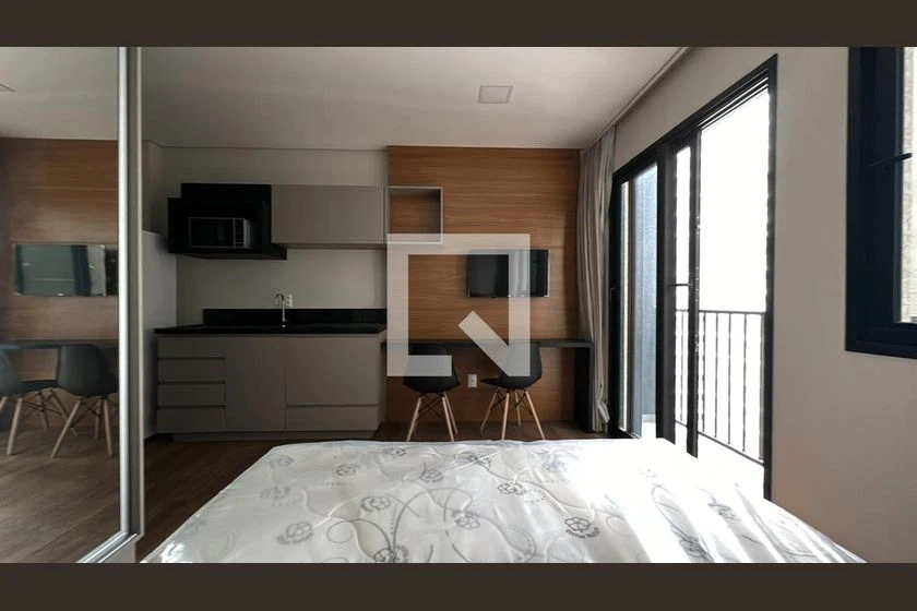 Furnished studio with 1 bedroom and compact kitchenette — photo 8