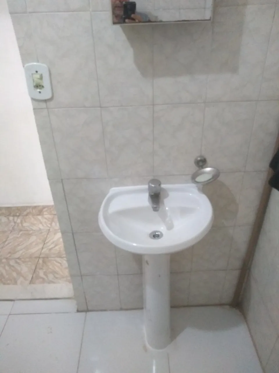1-bedroom 1-bath apartment with a laundry area — photo 9