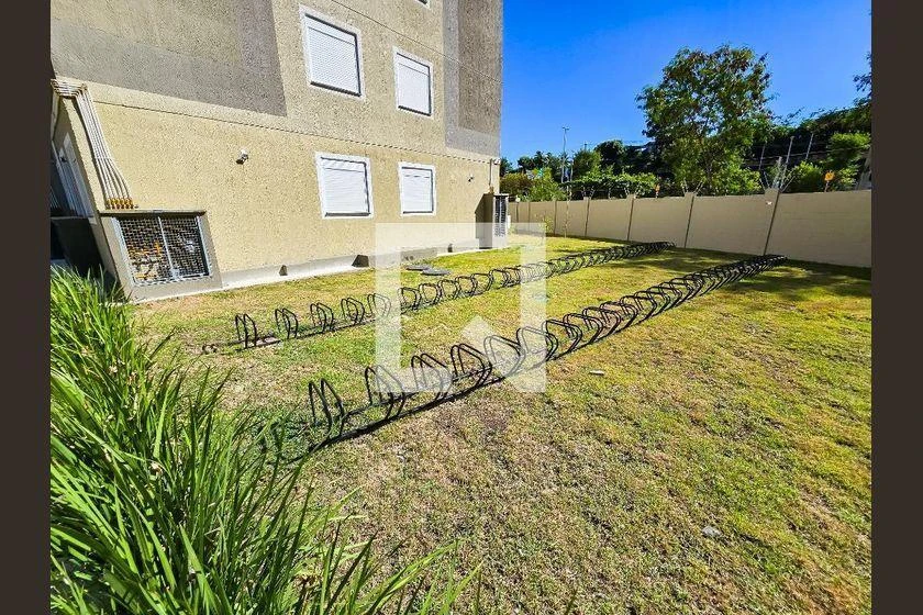 2-bedroom apartment in a building with a pool — photo 35