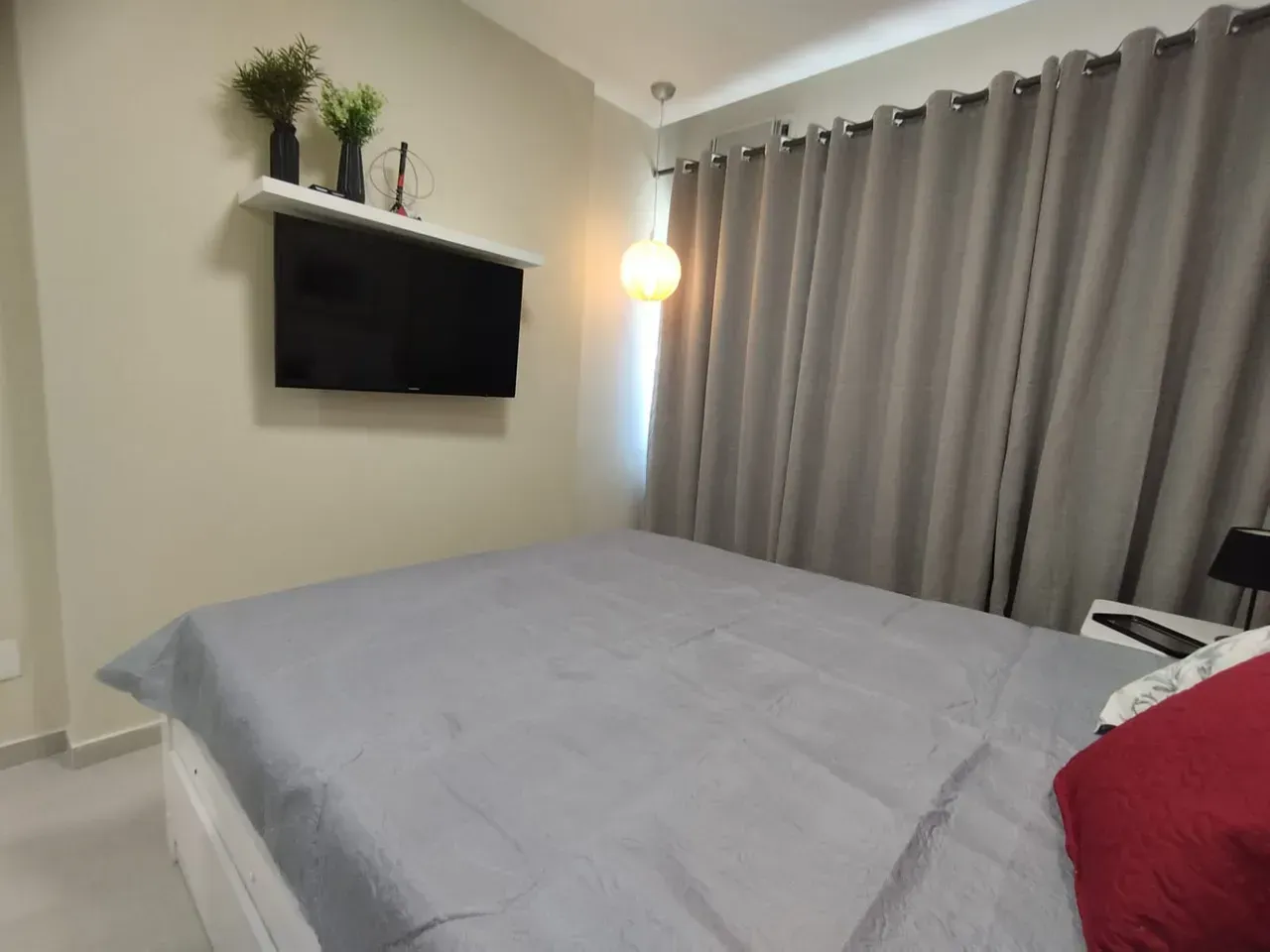Furnished apartment with a compact cooking setup — photo 19
