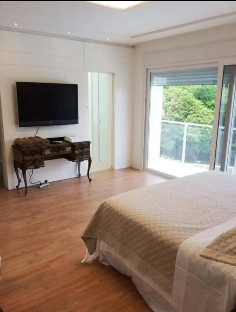 Casa com 6 suítes e área de piscina compartilhada — photo 3