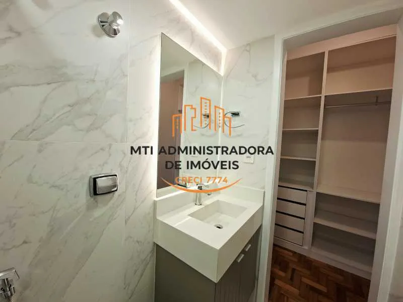 2-bedroom apartment in a building with a pool — photo 14