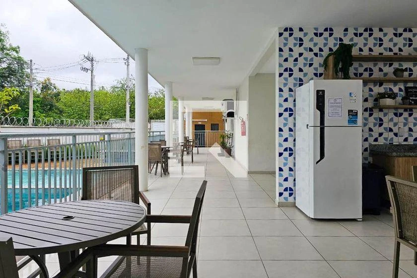 2-bedroom apartment in a building with a pool — photo 15