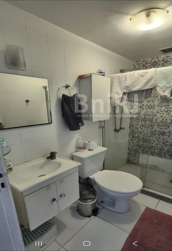 2-bedroom apartment in a building with a pool — photo 8