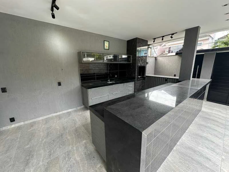 Casa com 4 suítes e 292 m², com 3 vagas e churrasqueira — photo 19