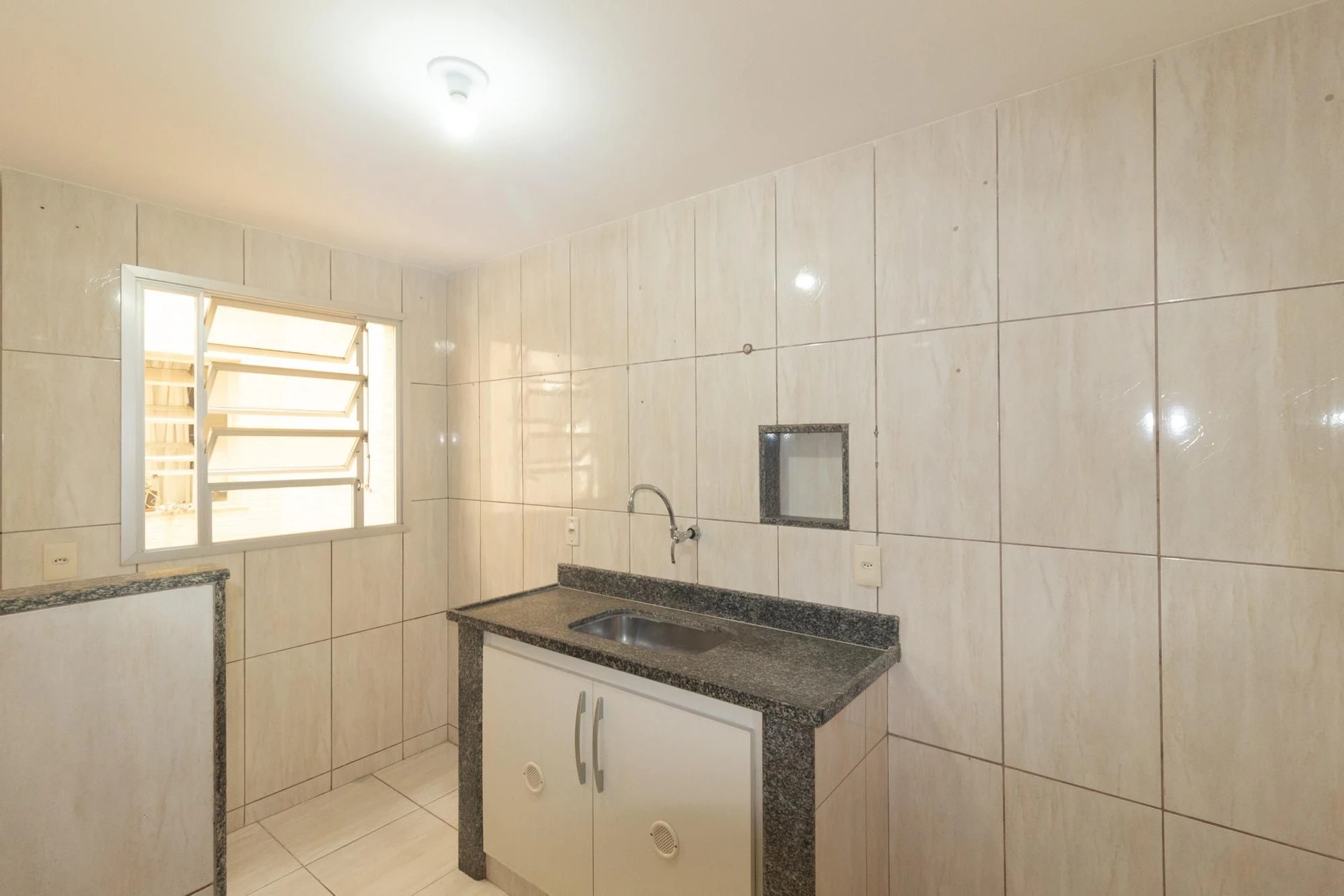 Apartamento de 1 quarto com 1 vaga e área de serviço — photo 2