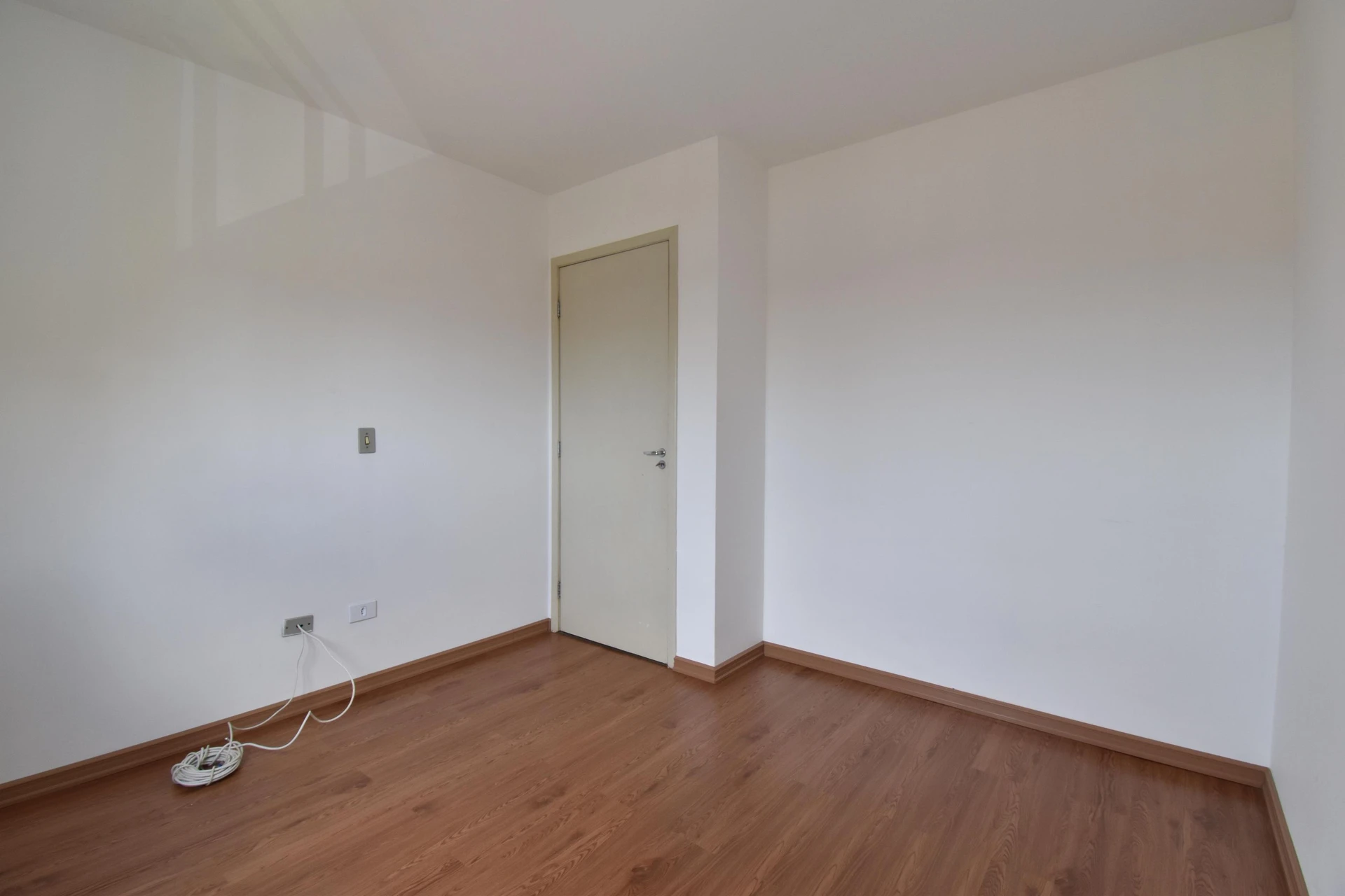 Wood or laminate floors in a 3-bedroom apartment, 53 m² — photo 4