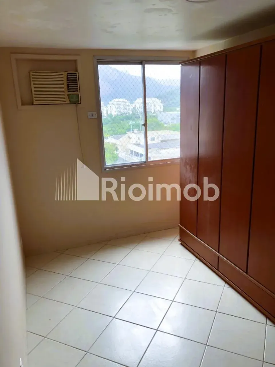 2-bedroom apartment in a building with a pool — photo 13