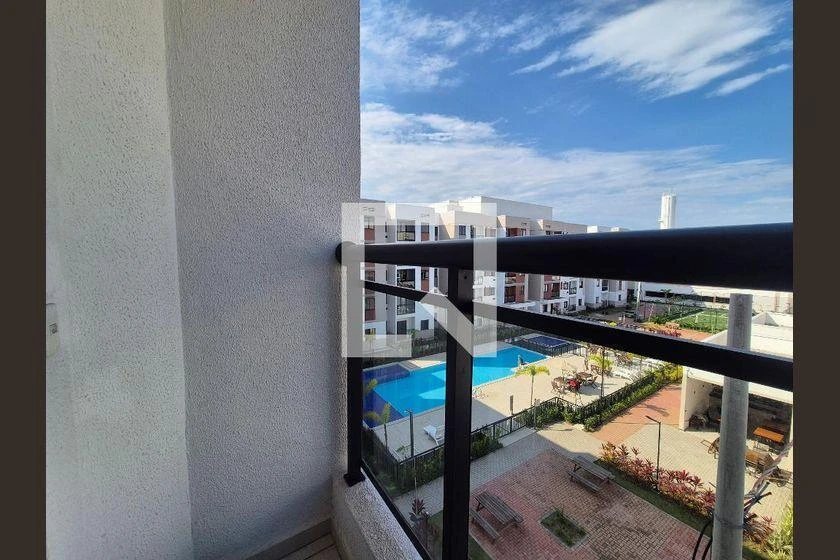 2-bedroom apartment in a building with a pool — photo 33