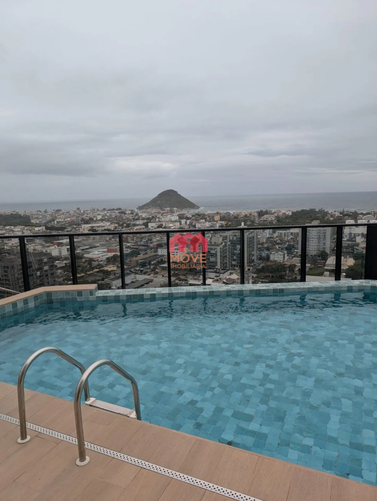 2-bedroom apartment in a building with a pool — photo 12