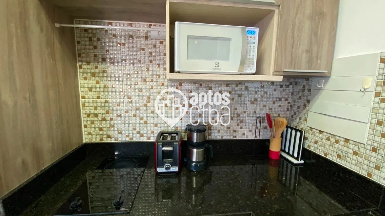 Furnished 1-bedroom apartment with an open-plan kitchen — photo 18