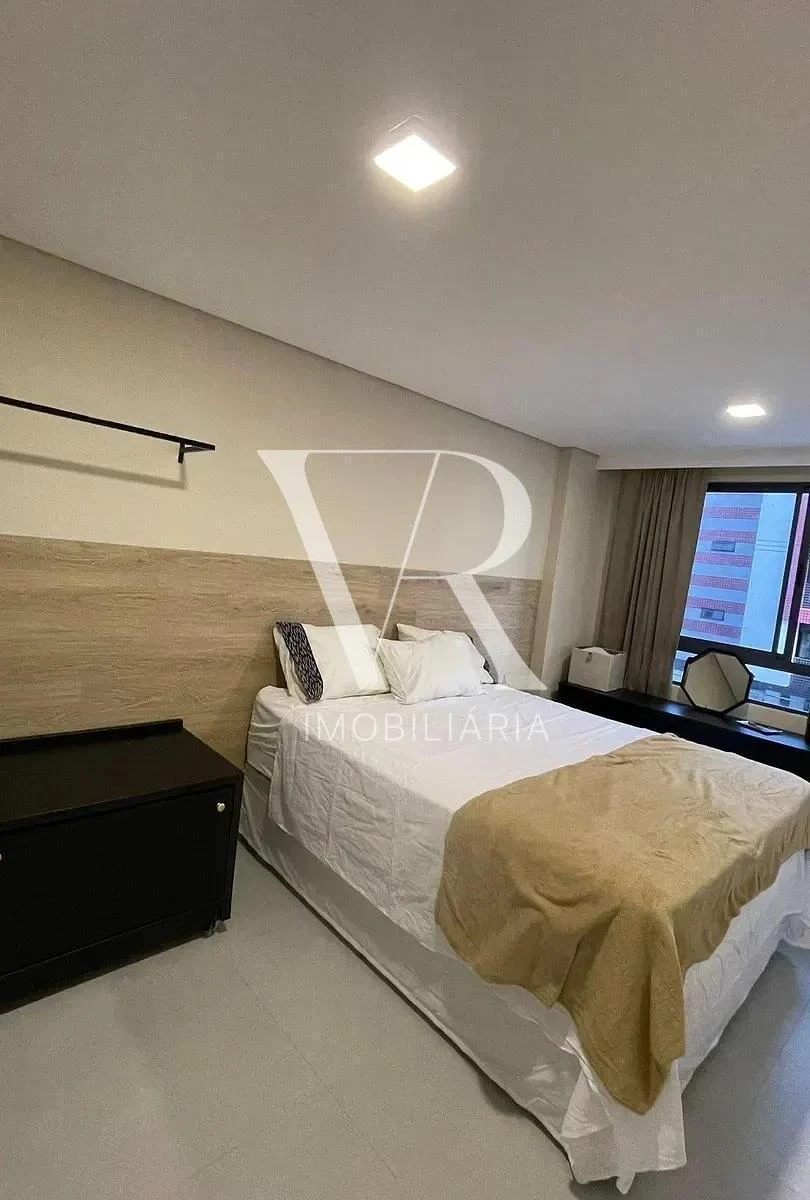 2-bedroom apartment in a building with a pool — photo 9