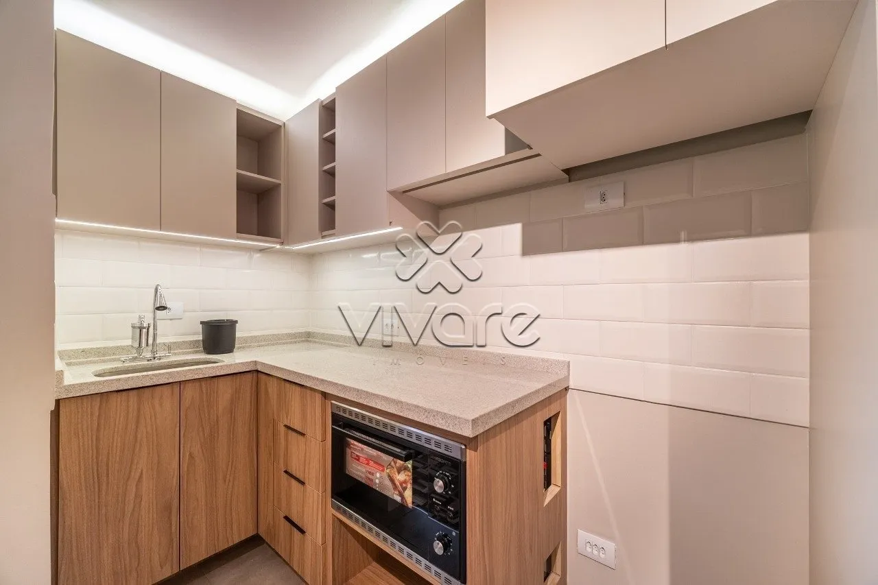 1-bedroom apartment with open-plan kitchen and electric oven — photo 5