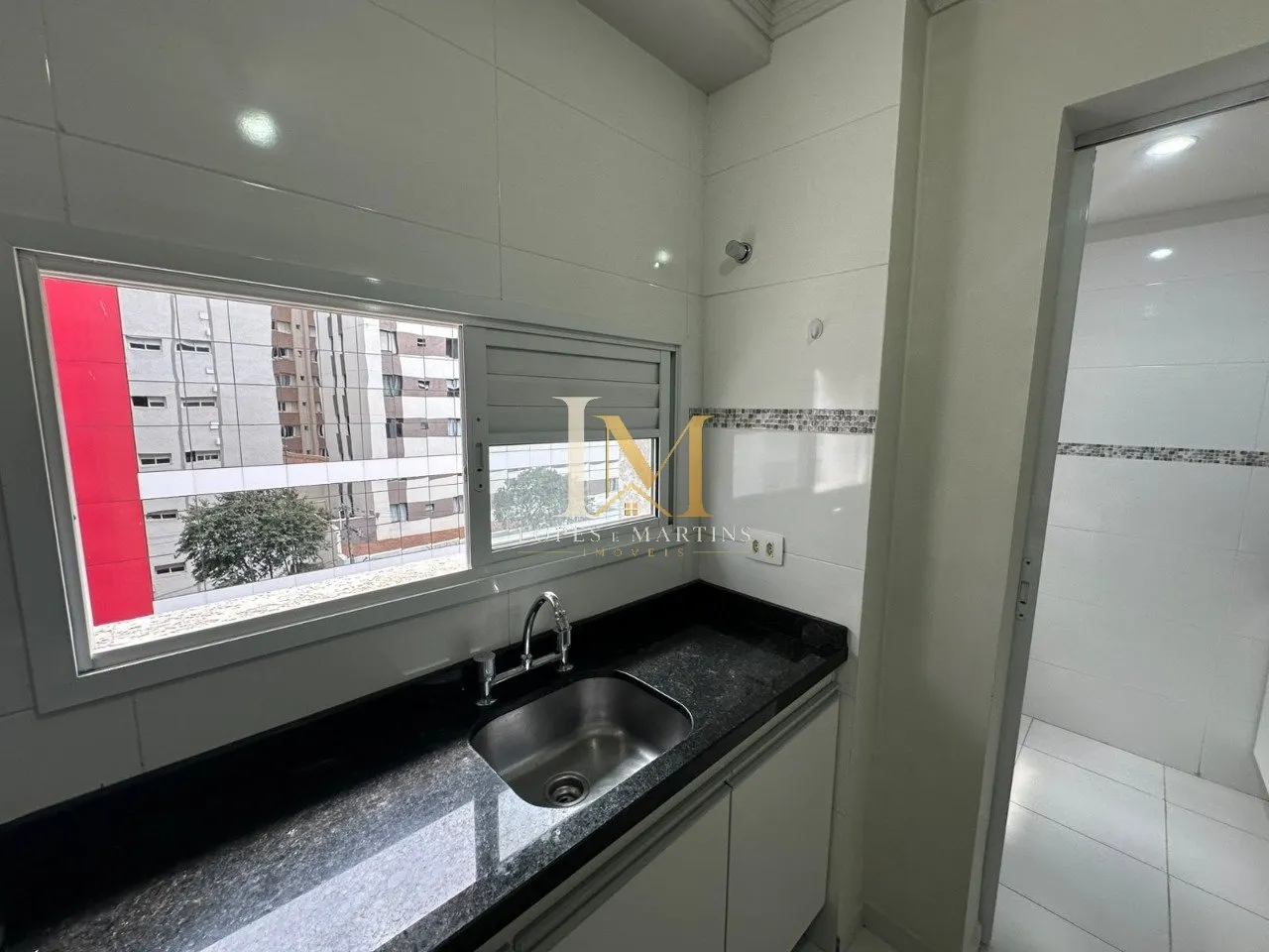 One-bedroom apartment with wood or laminate floors — photo 14