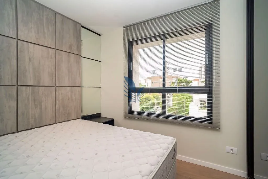 1-bedroom rental with open-plan kitchen and BBQ — photo 21