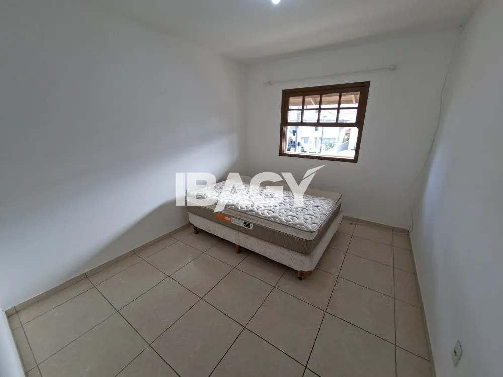 House with 2 bedrooms and a kitchen with stove and hood — photo 11