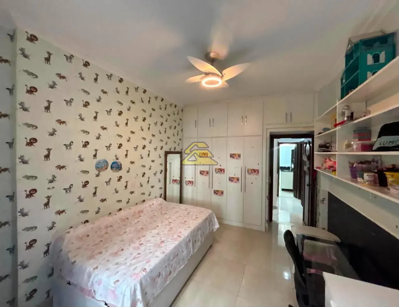 3-bedroom apartment with wall TV unit and tile floors — photo 18