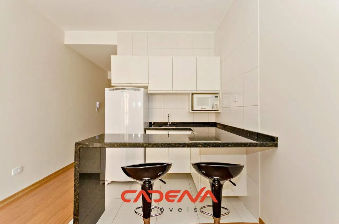 42 m² unfurnished studio with open kitchen and wood floors — photo 3