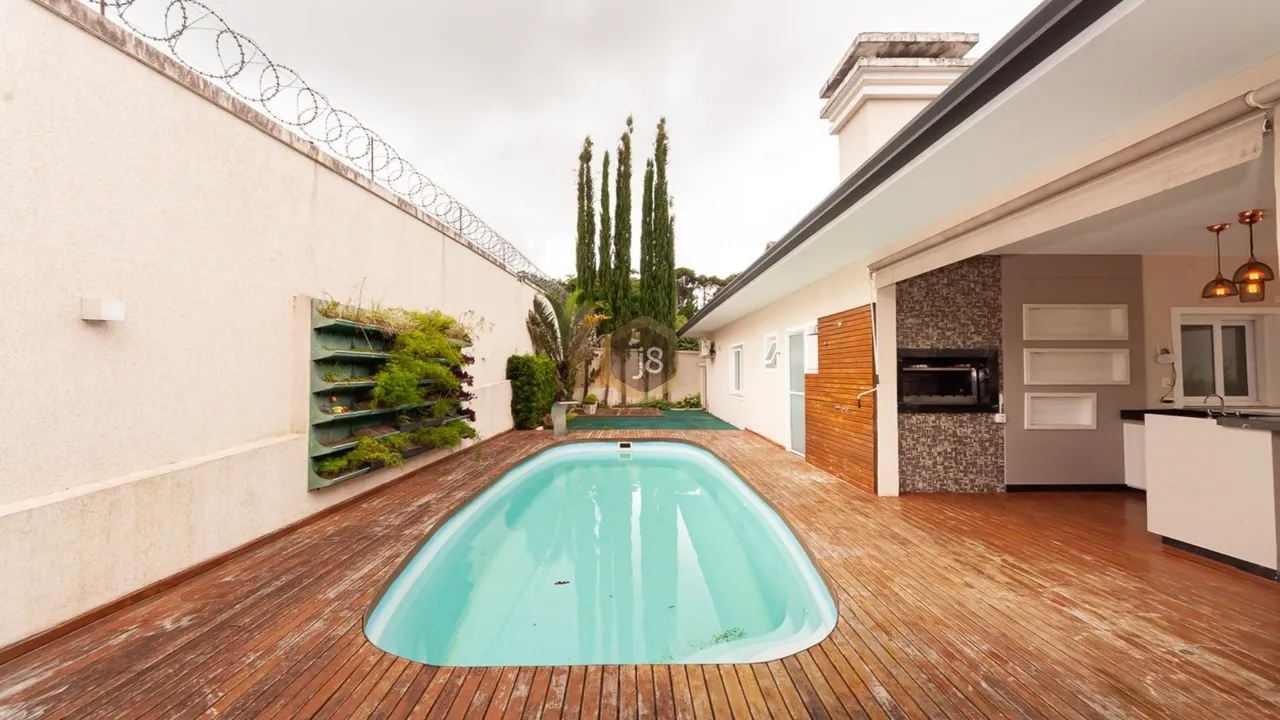 Casa com 5 suítes, 7 banheiros e 375 m² com varanda — photo 20