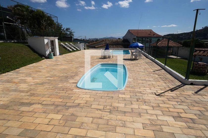 2-bedroom apartment in a building with a pool — photo 6