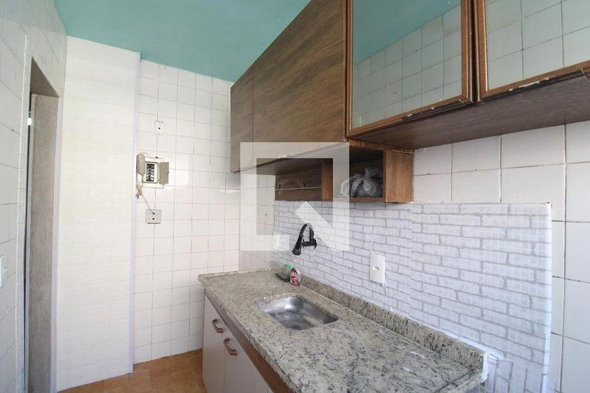 2-bedroom apartment in a building with a pool — photo 12