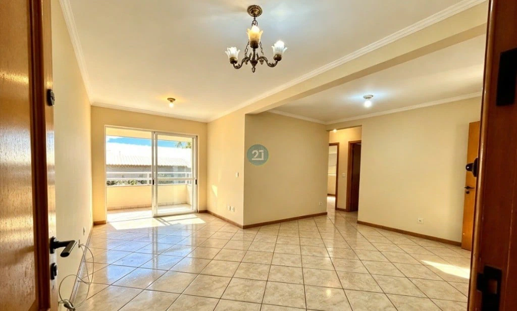 3-bedroom apartment in a building with a pool
