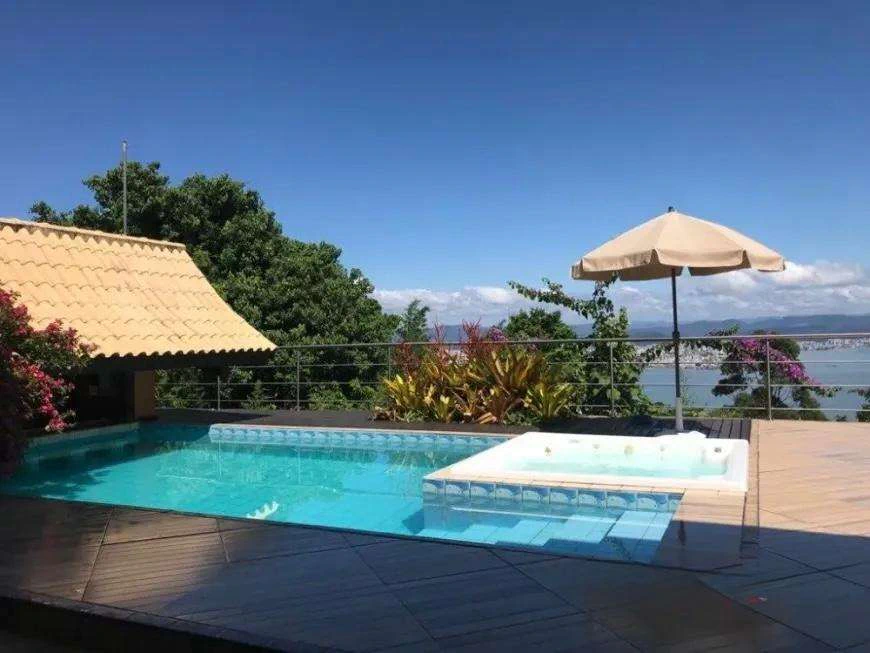 Casa em condomínio com 4 quartos e 1 vaga, 572 m² — photo 2