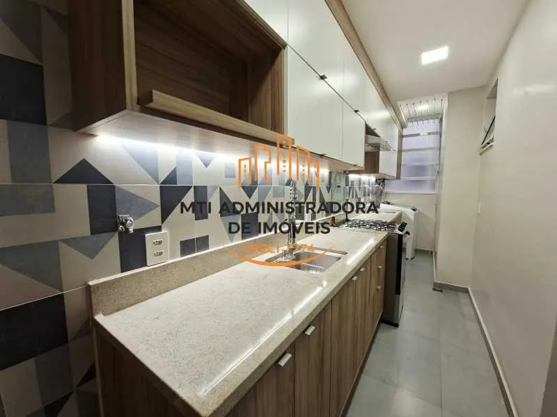 2-bedroom apartment in a building with a pool — photo 2