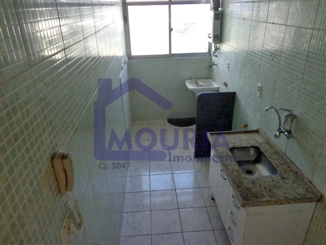 2-bedroom apartment in a building with a pool — photo 2
