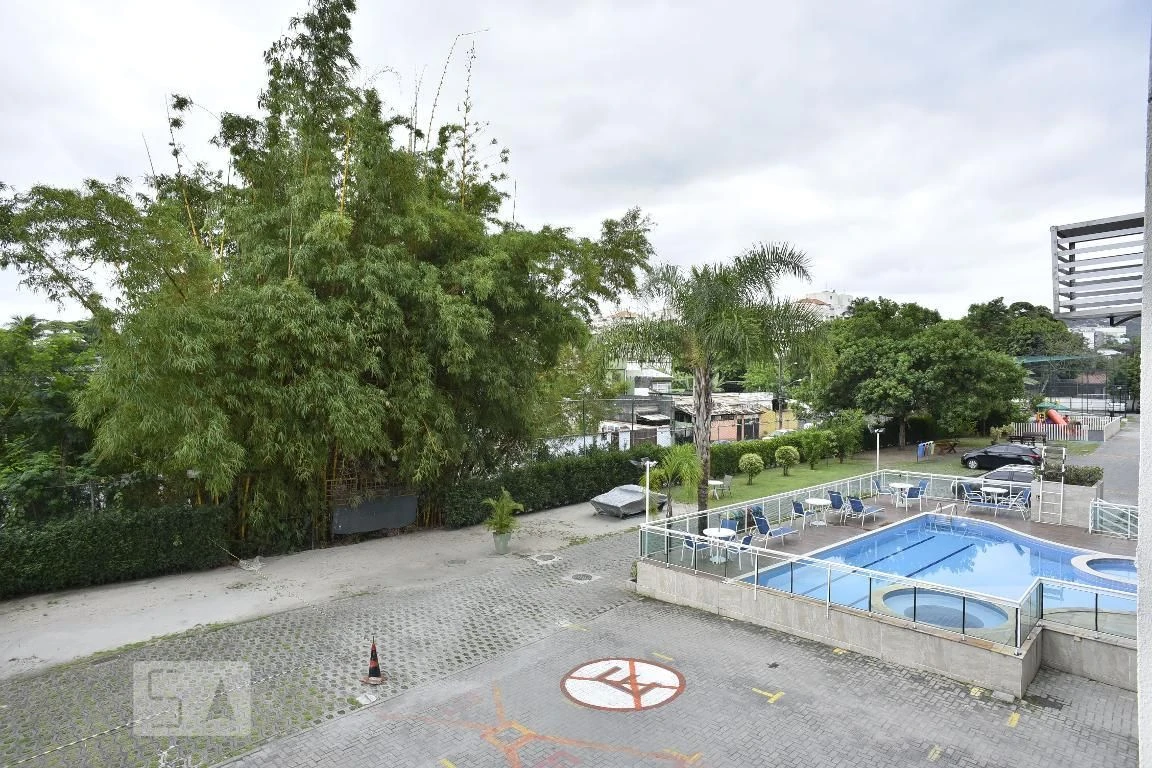 2-bedroom apartment in a building with a pool — photo 36