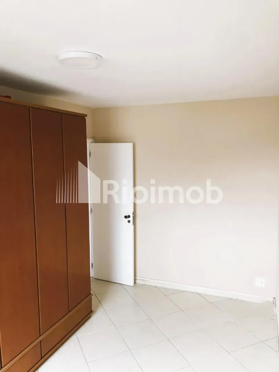 2-bedroom apartment in a building with a pool — photo 10