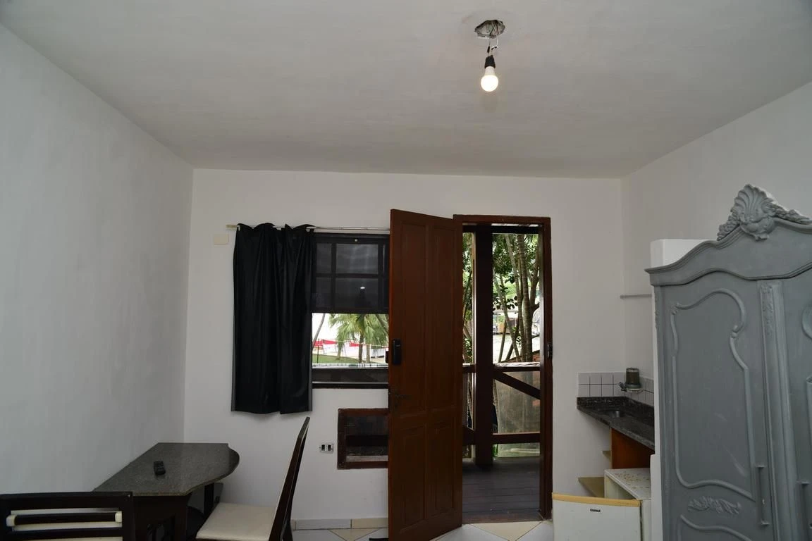 One-bedroom apartment in a building with a pool — photo 6